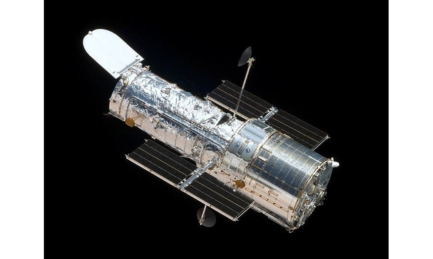 NASA’s Hubble Space Telescope orbiting Earth (Wikimedia Commons)
