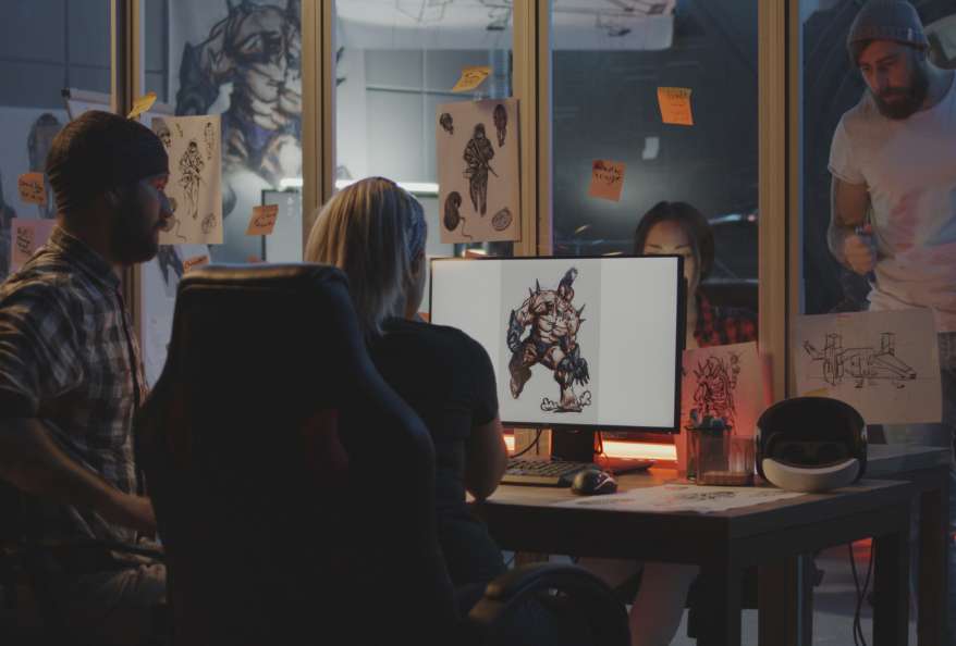 Developer Team Discussing Game Art